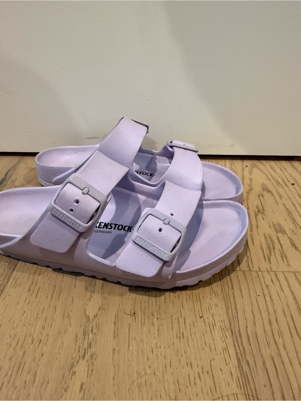 Birkenstock women’s Arizona EVA Sandals in Pale Lilac